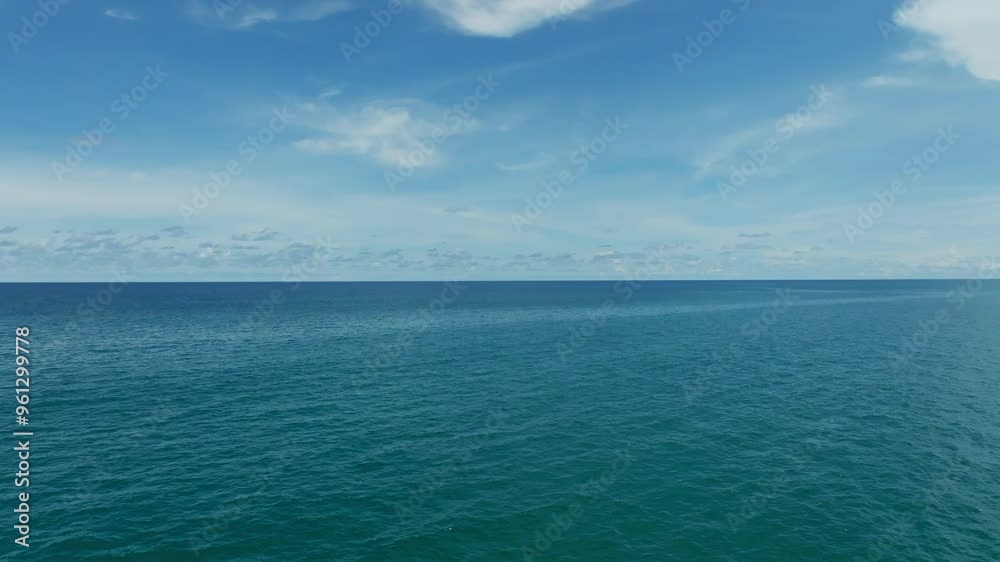 Aerial view beautiful sea in Phuket island Thailand,ocean and summer sky background, Drone tilt up fast shot Aerial view beautiful sea in Phuket island Thailand,ocean and summer sky background, Drone tilt up fast shot