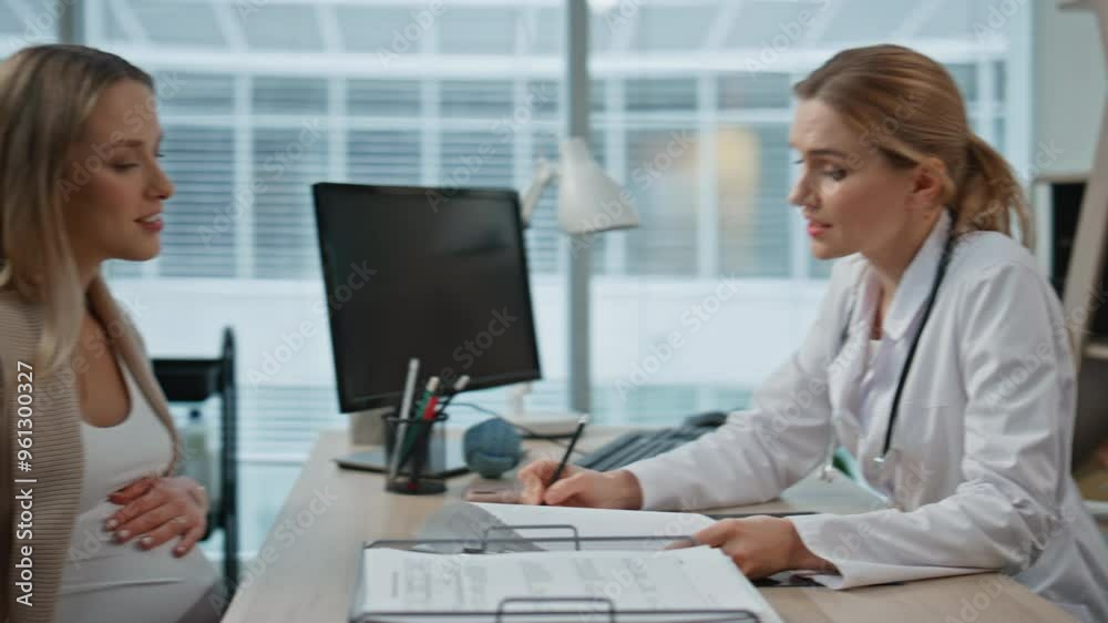 Woman doctor explaining diagnosis during appointment. Closeup smiling expectant Woman doctor explaining diagnosis during appointment. Closeup smiling expectant