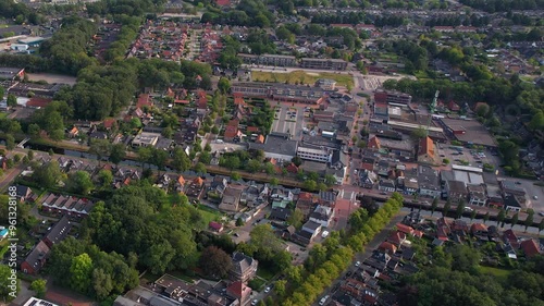 An aerial panorama view around the downtown of the city Oosterwolde on a sunny summer day in the Netherlands photo