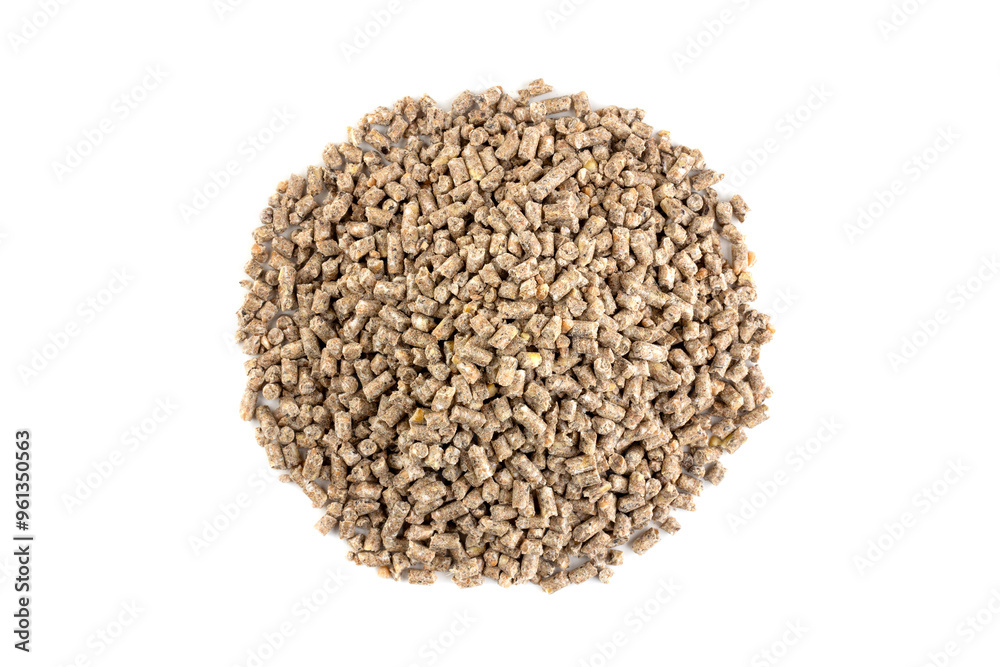 a pile of compound feed for feeding animals and poultry isolated on a white background top view a pile of compound feed for feeding animals and poultry isolated on a white background top view