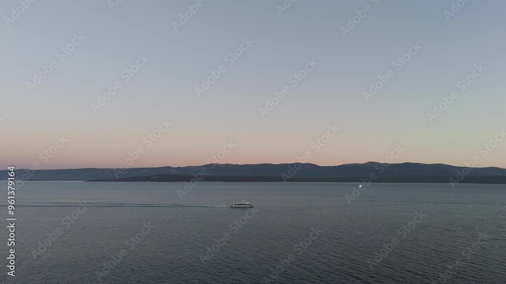 Aerial View of the Zlatni Rat Beach at Sunset in Bol on Brac Island, Split Dalmatia, in Croatia. Summer Vacation Resort Golden Cape or Golden Horn. Summertime. Famous Adriatic Beach on Adriatic Sea Aerial View of the Zlatni Rat Beach at Sunset in Bol on Brac Island, Split Dalmatia, in Croatia. Summer Vacation Resort Golden Cape or Golden Horn. Summertime. Famous Adriatic Beach on Adriatic Sea