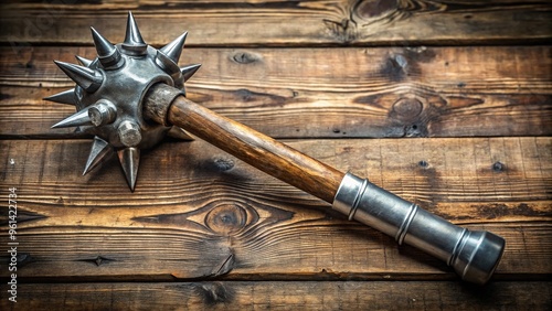 Ancient metallic battle hammer's spiked head sits majestically on worn wooden plinth, its rusty patina telling the tale of battles long past. photo