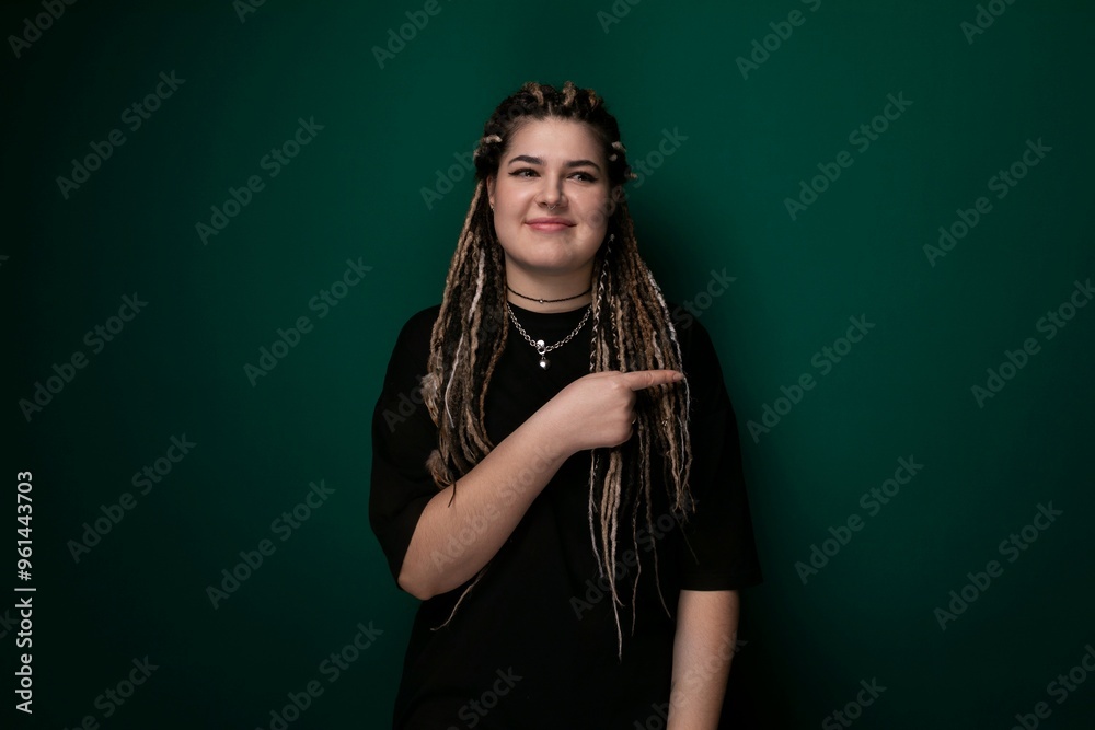 Woman With Dreadlocks Pointing at Something Woman With Dreadlocks Pointing at Something