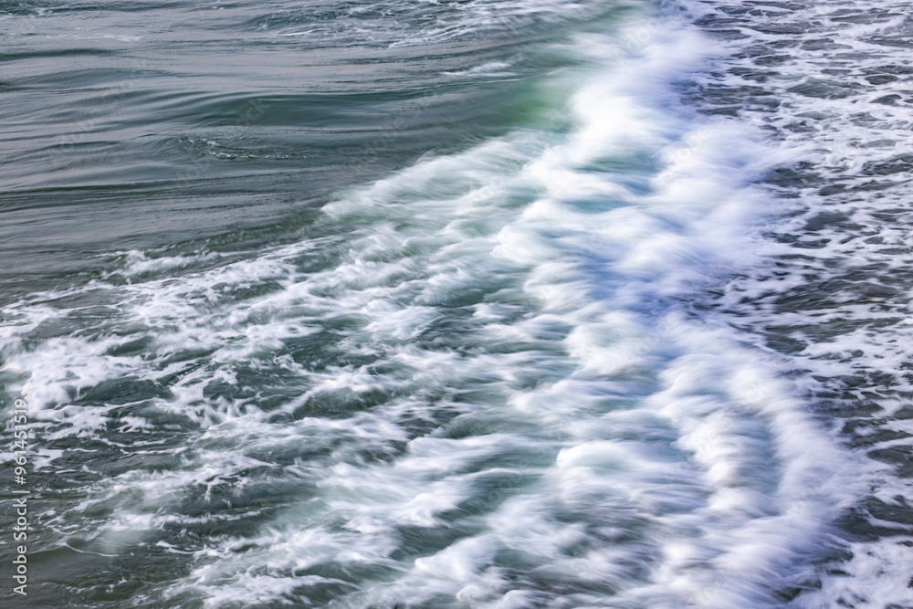 close-up of waves on the Channel coast in Normandy, France, with low shutterspeed close-up of waves on the Channel coast in Normandy, France, with low shutterspeed