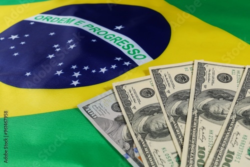 Brazilian flag with dollar bills, symbolizing national pride photo