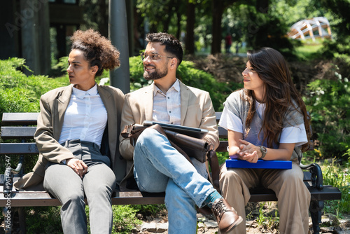 Business People teamwork Businesswoman and businessman outside office building Young experienced professional office workers in formal wear discussing opportunities analyzing ideas Finance and economy