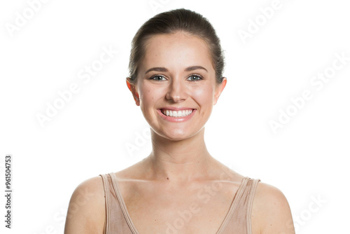 Pretty happy young female model with natural make-up, shiny clean skin and perfect smile. Beautiful woman face