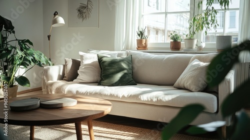 Cozy Scandinavian living room with a modern sofa, wooden table, and greenery, perfect for relaxing.