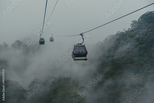 Cable car in the fog.Beautiful nature trail (da nang,vietnam)hill station and resort located in the Mountains west of the city of Da Nang, in central Vietnam. photo