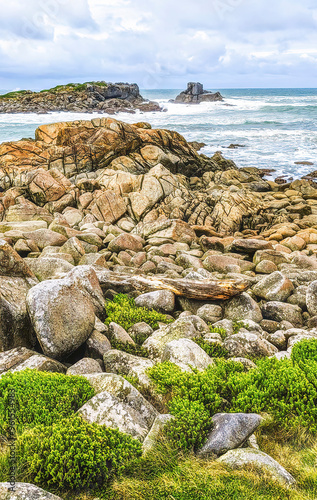 Gemstone beach, Orepuki, New Zealand, South Pacific ocean windy natural coast photo