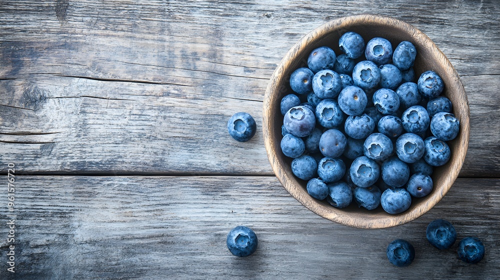 Fresh blueberries on a rustic wooden table, brain food, rich in antioxidants. Fresh blueberries on a rustic wooden table, brain food, rich in antioxidants.