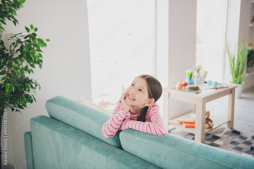 Photo portrait of young dreaming funny kid little brunette girl staying at home imagination daydreaming looking up isolated in her room Photo portrait of young dreaming funny kid little brunette girl staying at home imagination daydreaming looking up isolated in her room