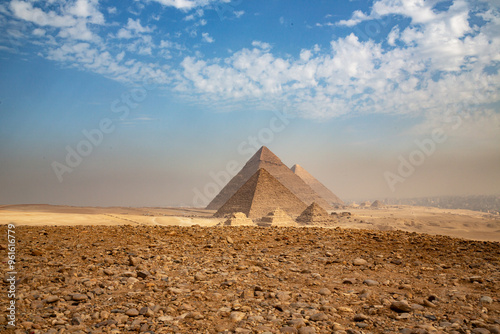 Egypt. Cairo - Giza. General view of pyramids from the Giza Plateau (three pyramids known as Queens' Pyramids on front side; next in order from left: the Pyramid of Menkaure, Khafre and Chufu photo