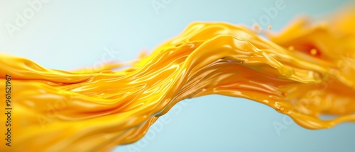  A tight shot of yellow liquid cascading down a blue-and-white wall against a backdrop of clear blue sky