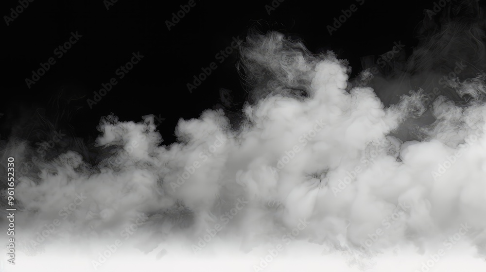 Dense white smoke billowing and filling frame on black background Dense white smoke billowing and filling frame on black background