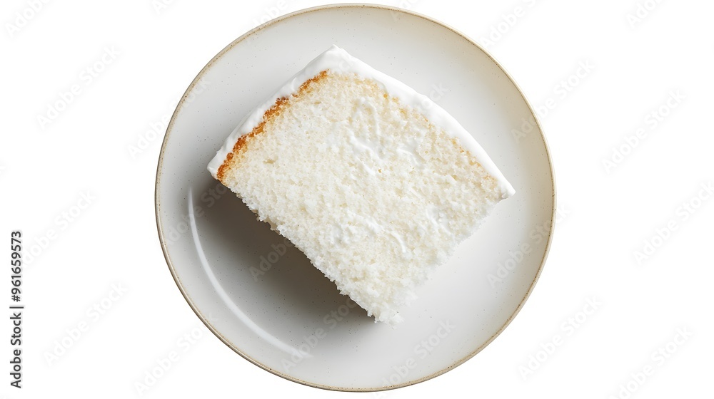 Slice of delicious vanilla cake with creamy frosting on a plate Slice of delicious vanilla cake with creamy frosting on a plate