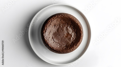 Minimalist dark chocolate cake on white plate — perfect for baking inspiration