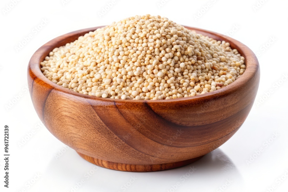 Quinoa grains in a wooden bowl, placed against a clean white background, providing a classic canvas for your