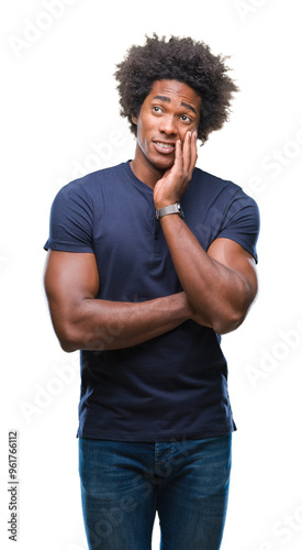 Afro american man over isolated background thinking looking tired and bored with depression problems with crossed arms.