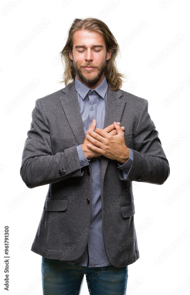 Young handsome business man with long hair over isolated background smiling with hands on chest with closed eyes and grateful gesture on face. Health concept. Young handsome business man with long hair over isolated background smiling with hands on chest with closed eyes and grateful gesture on face. Health concept.