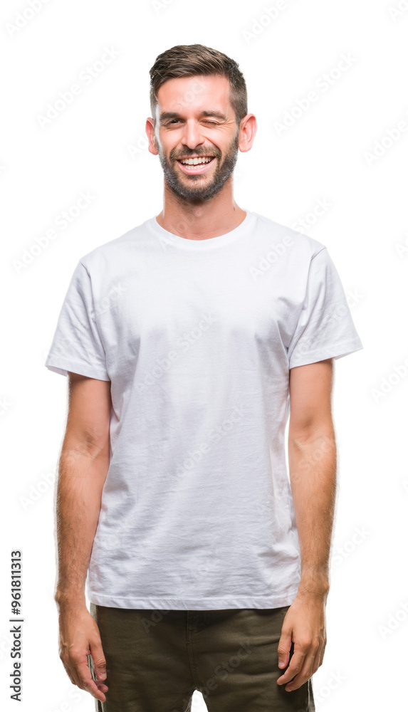 Young handsome man over isolated background winking looking at the camera with sexy expression, cheerful and happy face. Young handsome man over isolated background winking looking at the camera with sexy expression, cheerful and happy face.