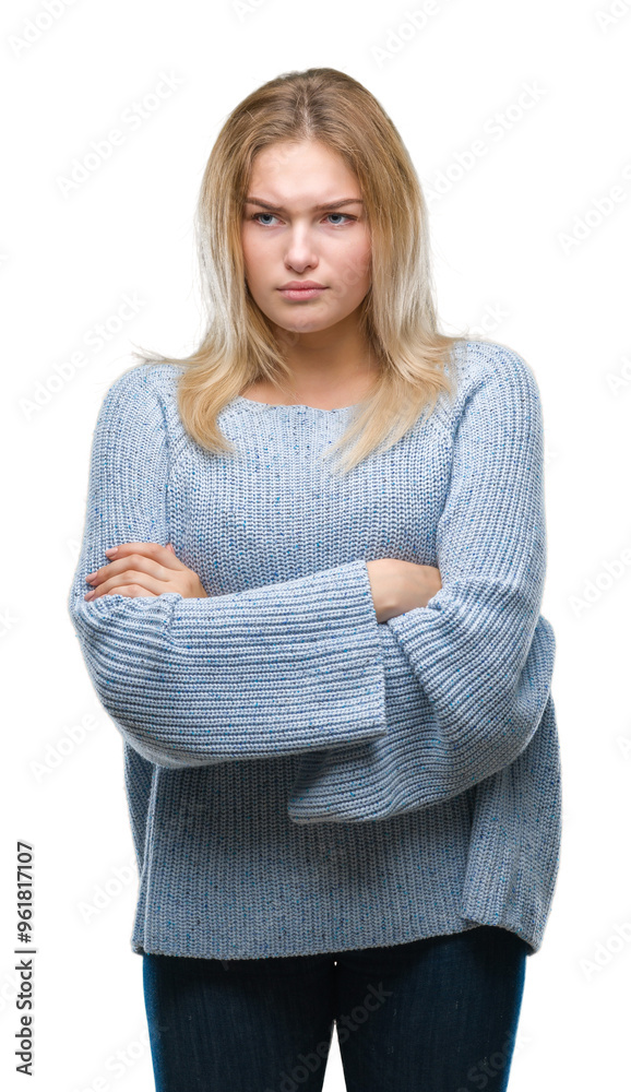 Young caucasian woman wearing winter sweater over isolated background skeptic and nervous, disapproving expression on face with crossed arms. Negative person. Young caucasian woman wearing winter sweater over isolated background skeptic and nervous, disapproving expression on face with crossed arms. Negative person.