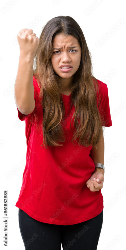 Young beautiful brunette woman wearing red t-shirt over isolated background angry and mad raising fist frustrated and furious while shouting with anger. Rage and aggressive concept. Young beautiful brunette woman wearing red t-shirt over isolated background angry and mad raising fist frustrated and furious while shouting with anger. Rage and aggressive concept.