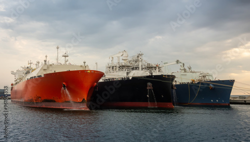 LNG gas oil tankers transferring gas. LNG tankers during ship-to-ship gas transfer operation