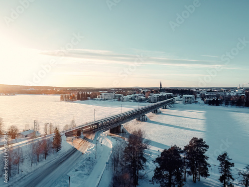 Aerial view of railway bridge over Ounasjoki river in Rovaniemi, Lapland