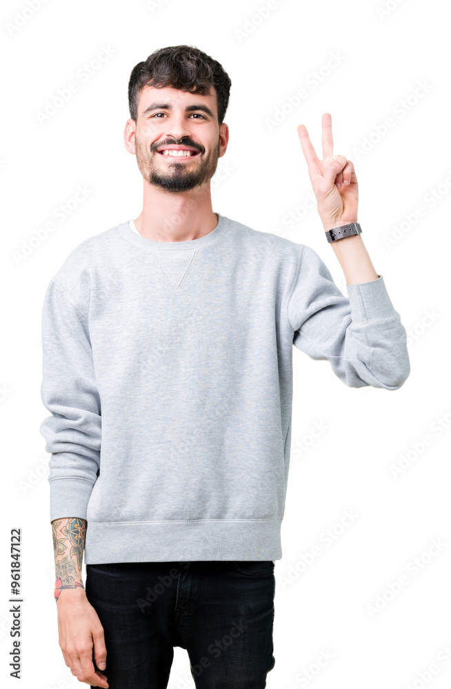 Young handsome man wearing sweatshirt over isolated background showing and pointing up with fingers number two while smiling confident and happy. Young handsome man wearing sweatshirt over isolated background showing and pointing up with fingers number two while smiling confident and happy.