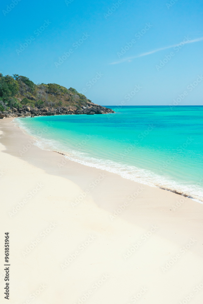 Tropical beach, turquoise sea water, ocean wave, white sand, green palms, sun blue sky, white clouds, beautiful seascape, summer background and summer holiday concept. Tropical beach, turquoise sea water, ocean wave, white sand, green palms, sun blue sky, white clouds, beautiful seascape, summer background and summer holiday concept.
