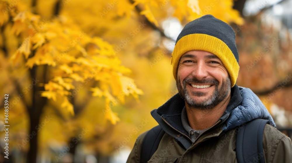 A man wearing a yellow A man wearing a yellow
