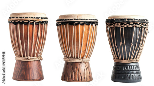 Three colorful wooden African djembe drums, isolated on a black background, emit a sense of rhythm and cultural vibrancy.  photo