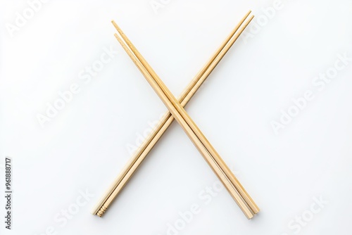 Two pairs of crossed chopsticks on a white background.