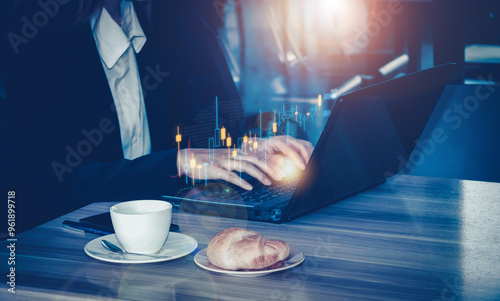 Close -up young business woman working on the computer in cafe
