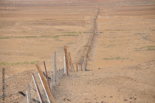 View of long dingo fence used to keep out dingoes in South Australia