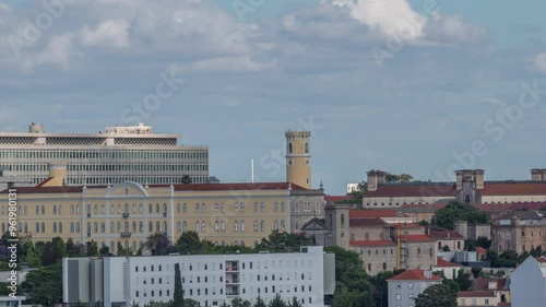 Aerial timelapse panorama of Lisbon city center with old prison (Estabelecimento Prisional de Lisboa), Colegio Almada Negreiros and Palacio da Justica. Located near Eduardo VII park. Portugal photo