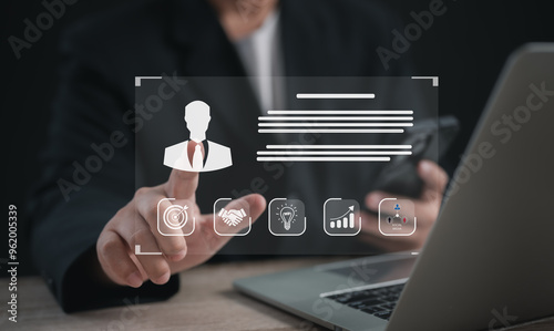 Human Resource Management (HR) concept: a businessman uses an interface for recruitment, leadership development, strategic customer targeting, company positions with precision and efficiency.
