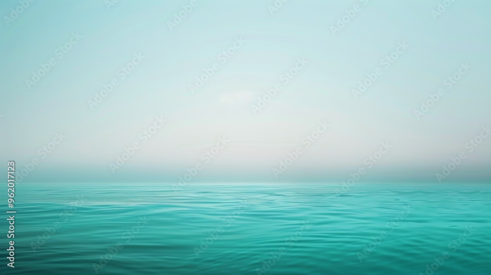 Obraz premium A minimalist background with a soft gradient transitioning from light blue to gentle turquoise