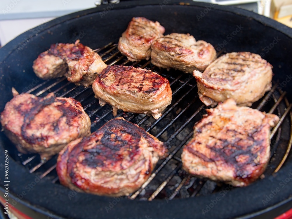 Tournedo steaks grilled on charcoal grill medium rare