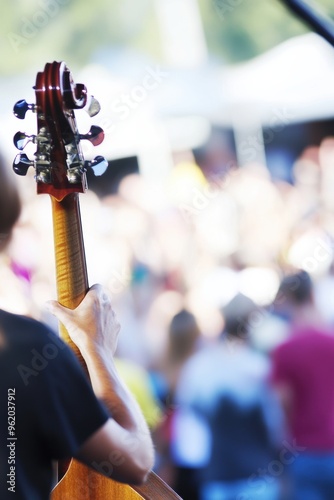 Musician Playing Guitar at Outdoor Concert
