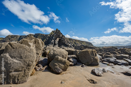 Large rock formation on Northcott Mouth beach Cornwall photo