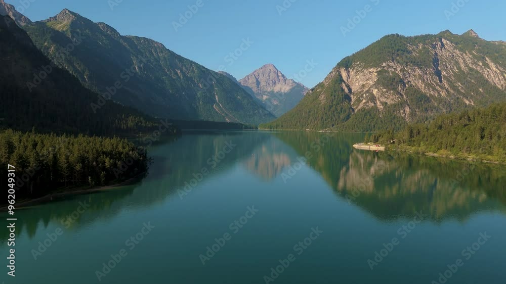 Lake Plansee Austria with majestic mountains alps around in the morning sunlight. High quality 4k footage Lake Plansee Austria with majestic mountains alps around in the morning sunlight. High quality 4k footage