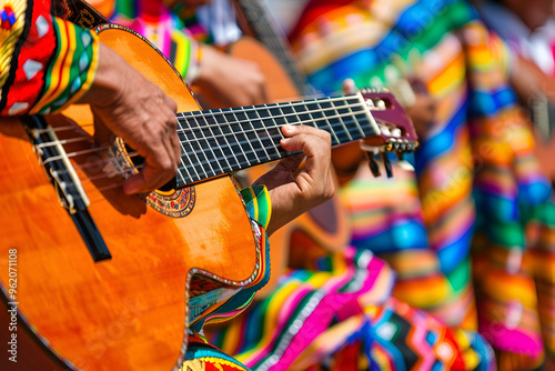Traditional Mexican musicians strumming guitars in colorful attire at a cultural festival