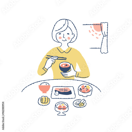 栄養バランスの良い朝食を食べている女性