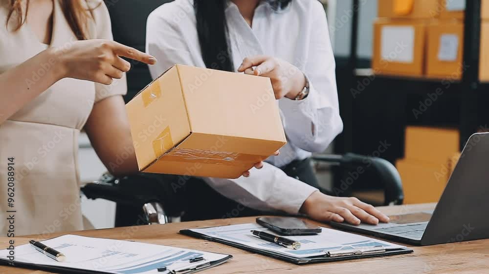 Small businesses SME owners female entrepreneurs check online orders to prepare to pack the boxes, sell to customers, sme business ideas online Small businesses SME owners female entrepreneurs check online orders to prepare to pack the boxes, sell to customers, sme business ideas online