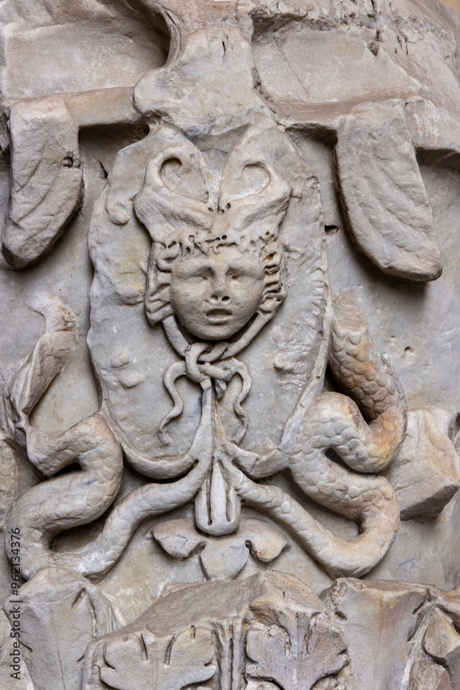 Beautiful sculptures carved in stone and marble in the Roman Colosseum. Rome, Italy.