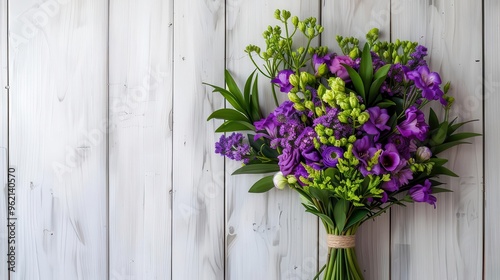 vibrant purple and green flower bouquet against a white wooden wall beautiful floral art with copy space