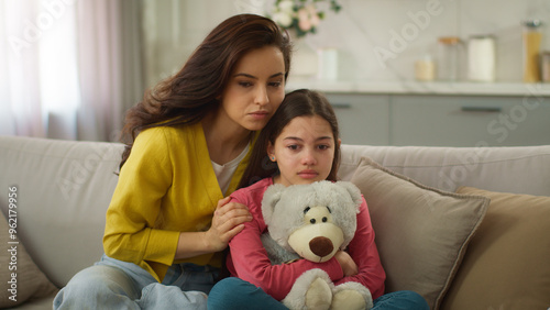 Fotografie Worried Caucasian parent woman feel guilty female mother apologizing ask forgive