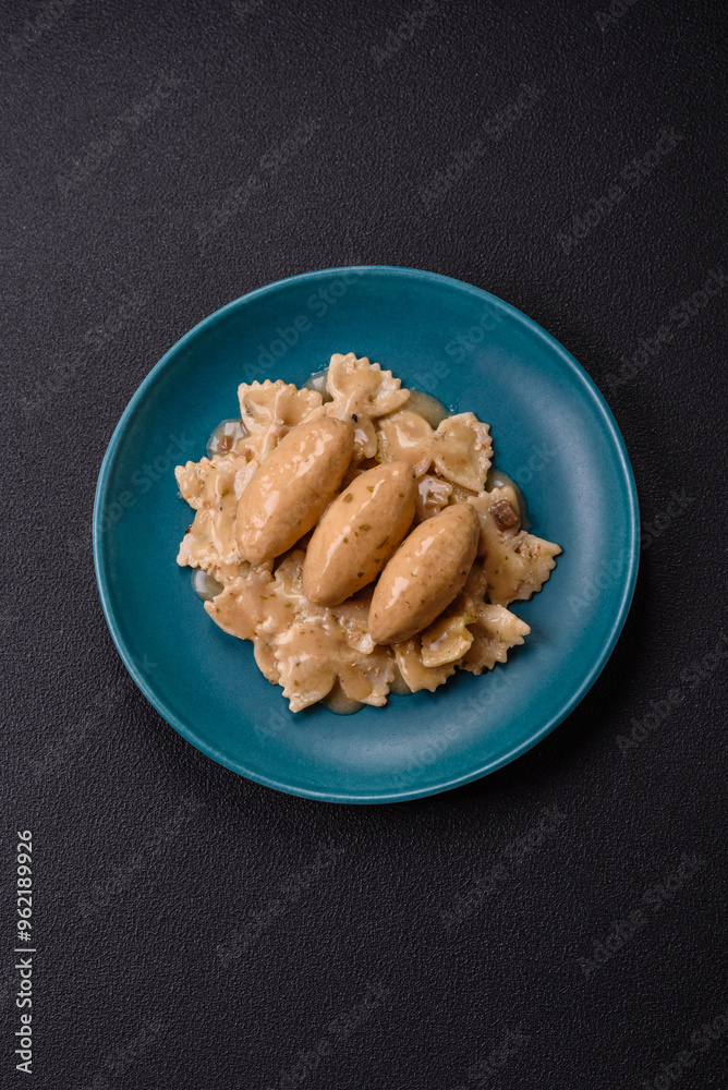 Fish or meat quenelles with delicate mushroom sauce, salt and spices Fish or meat quenelles with delicate mushroom sauce, salt and spices